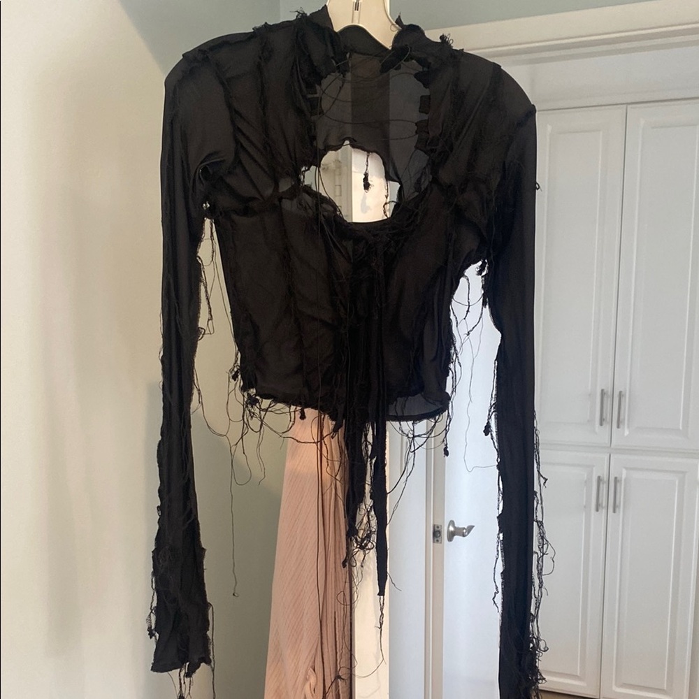 Matacomplex semi-sheer black blouse